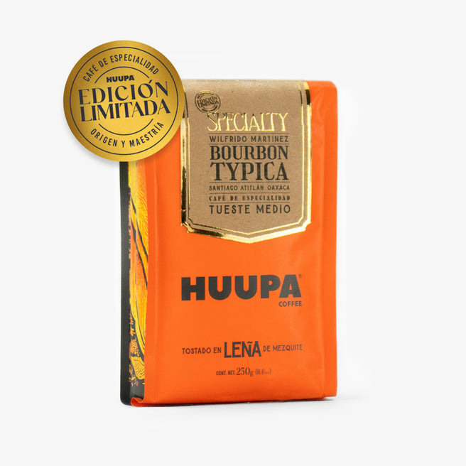 Bolsa naranja de 250 g de café de especialidad HUUPA, etiquetada como "Bourbon Typica", "Tueste Medio" y con una insignia dorada de "Edición Limitada".