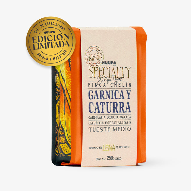 Bolsa naranja de 250 g de café de especialidad HUUPA, etiquetada como "Garnica y Caturra", "Tueste Medio" y con una insignia dorada de "Edición Limitada"