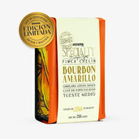 Bolsa naranja de 250 g de café de especialidad HUUPA, etiquetada como 